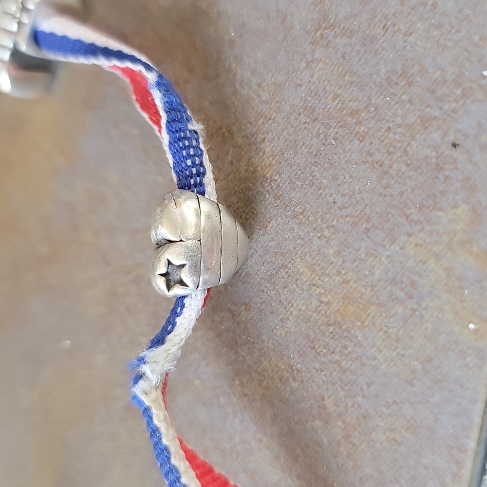 Pandora style flag heart charm Looks like there is a stamp of some sort,not sure